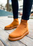 Torino X Espresso Essence knit ankle boot in light brown by Apollo Moda, on a wooden surface
