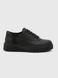 Apollo Moda Men's Zephyr Noir all-black platform sneaker with ridged sole, main product photo